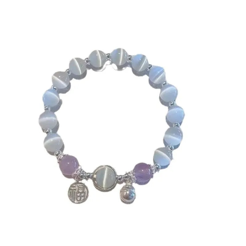 Glass butterfly bracelet for women with colour-coordinated beads in drop-shaped design