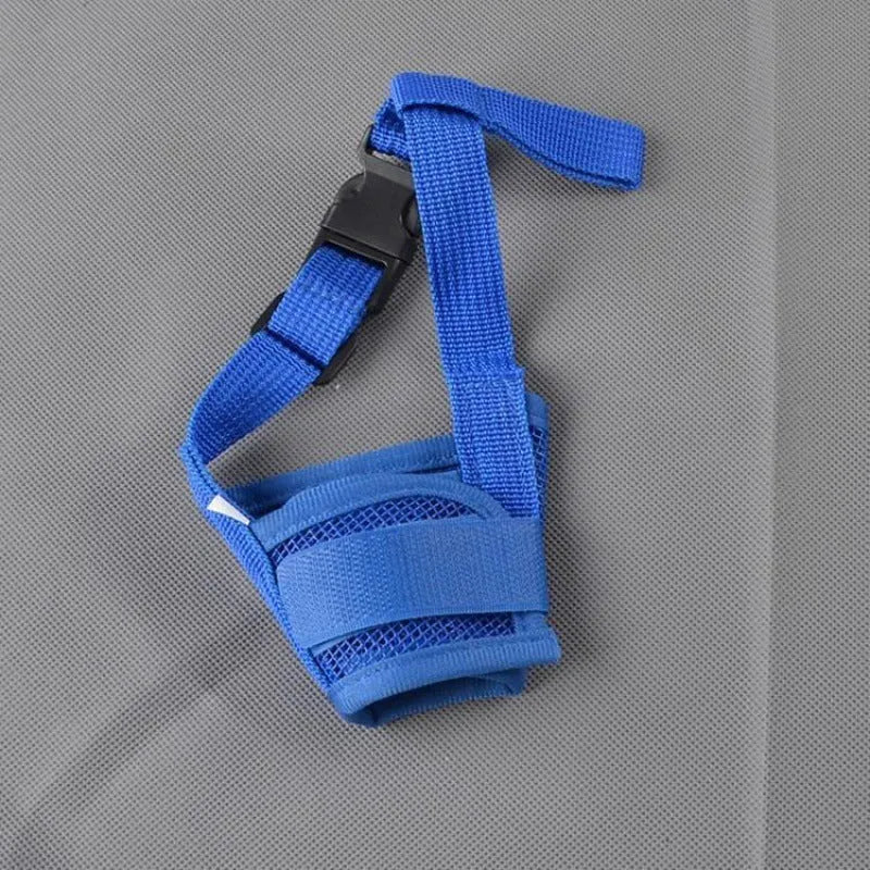 Adjustable plastic dog safety muzzle in black, shown on a size chart.