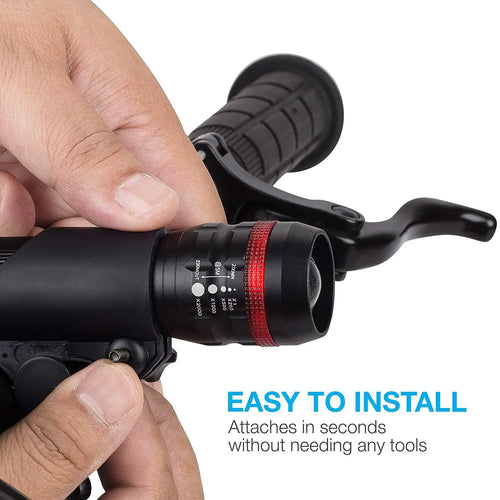 Bicycle headlight and red taillight set shown with a black mounting bracket on a handlebar.