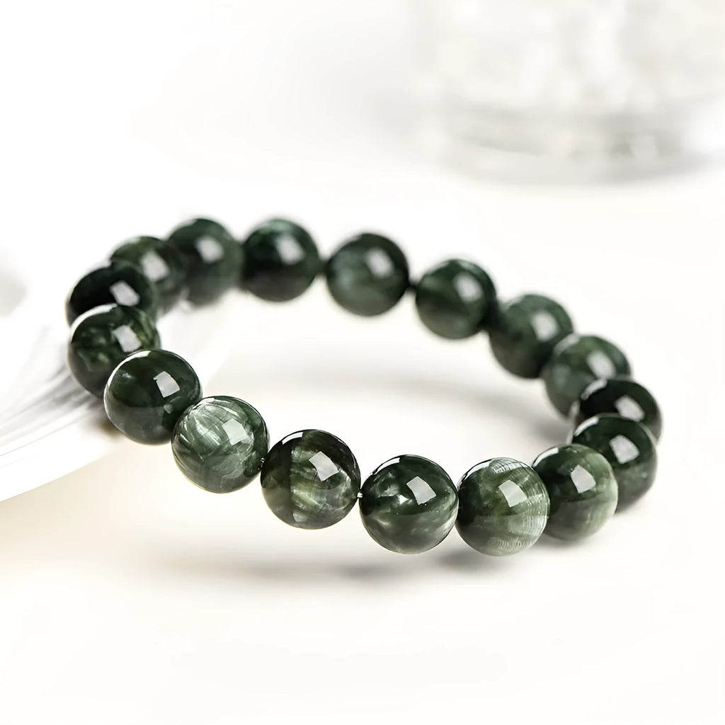 Green Dragon Crystal bracelet with 8-9mm round beads and Ruyi decoration in grade 7A natural green colour