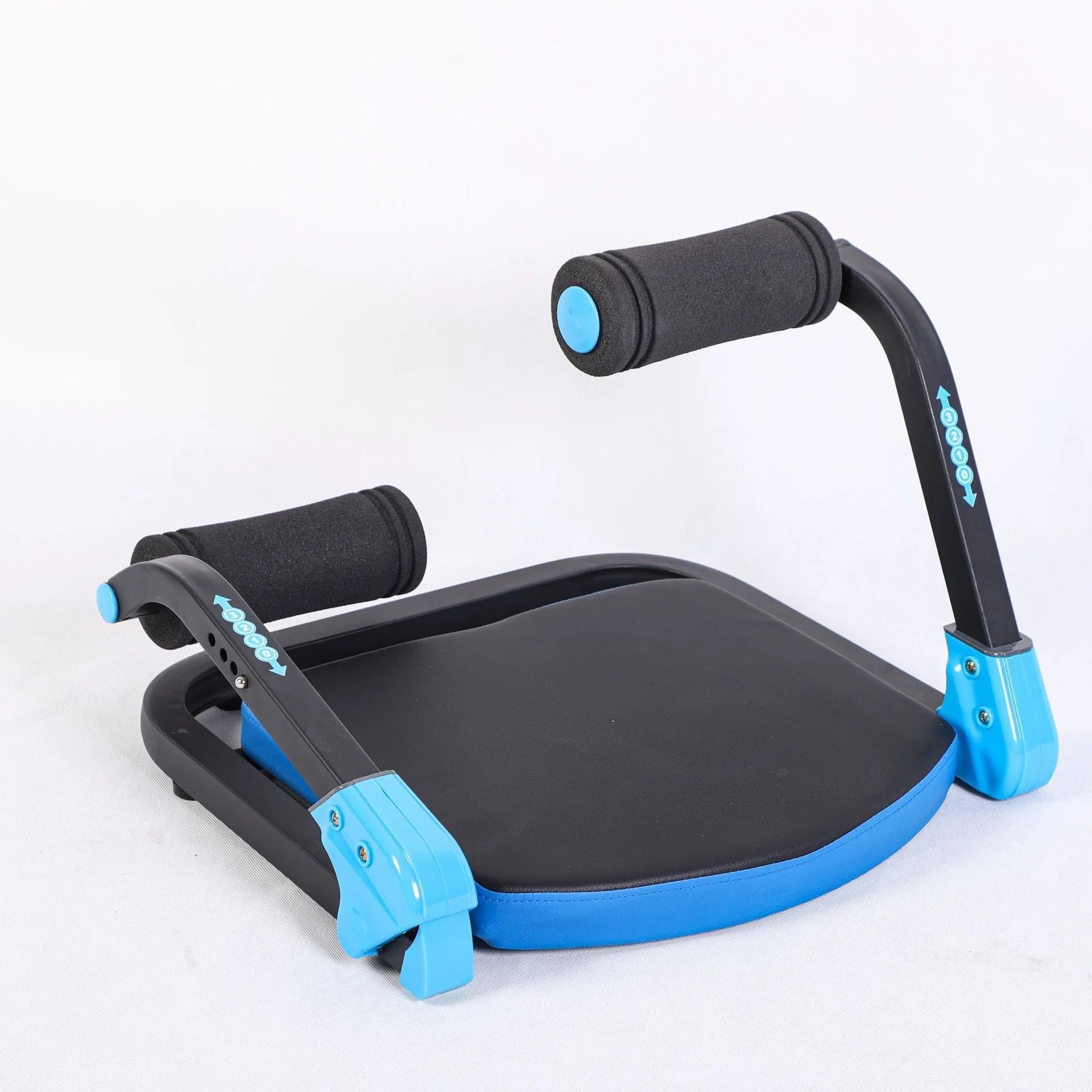 A compact red or sky blue multifunctional abdominal exercise device for home and office fitness.