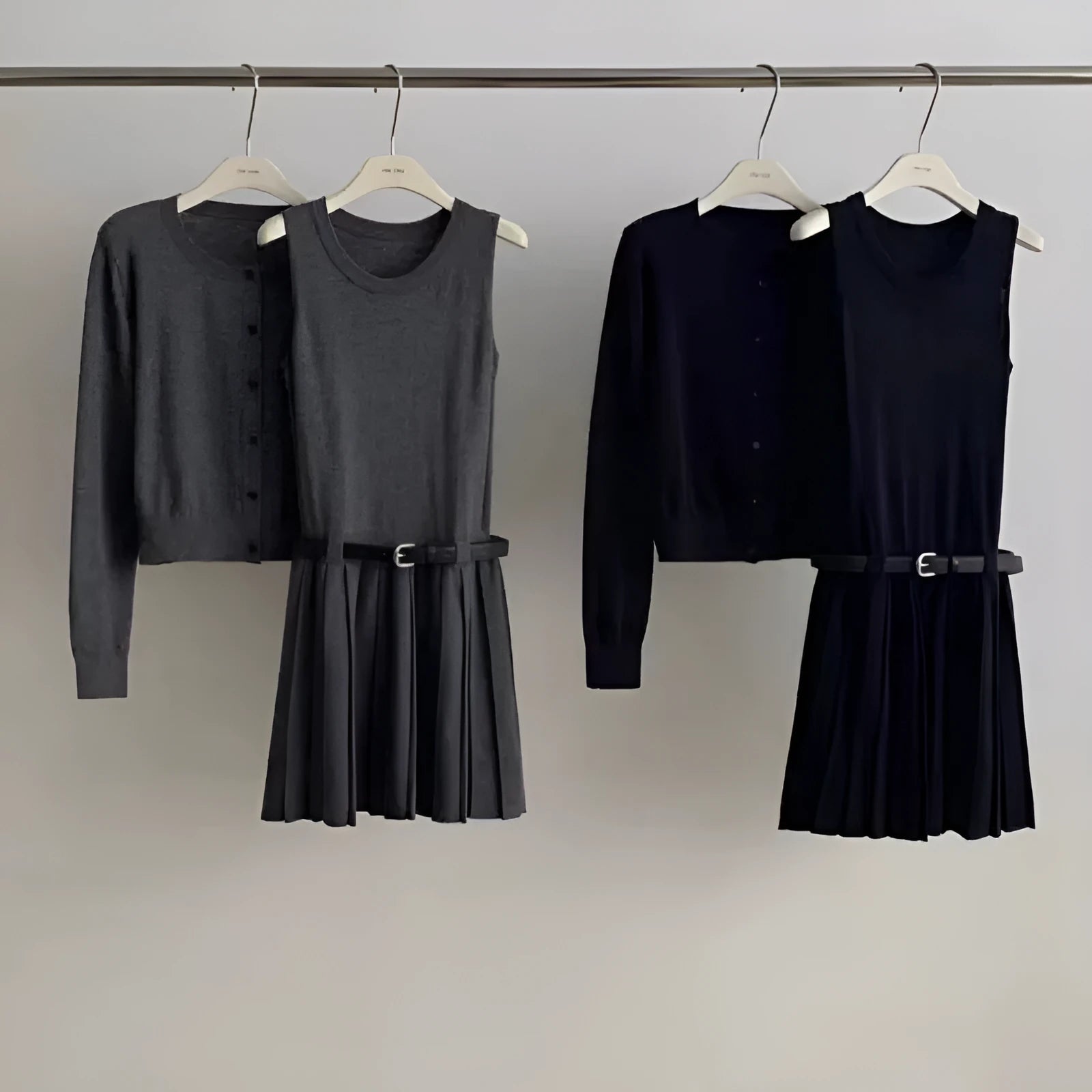 Women's grey art retro knitted vest skirt and cardigan two-piece set with 3D pattern.