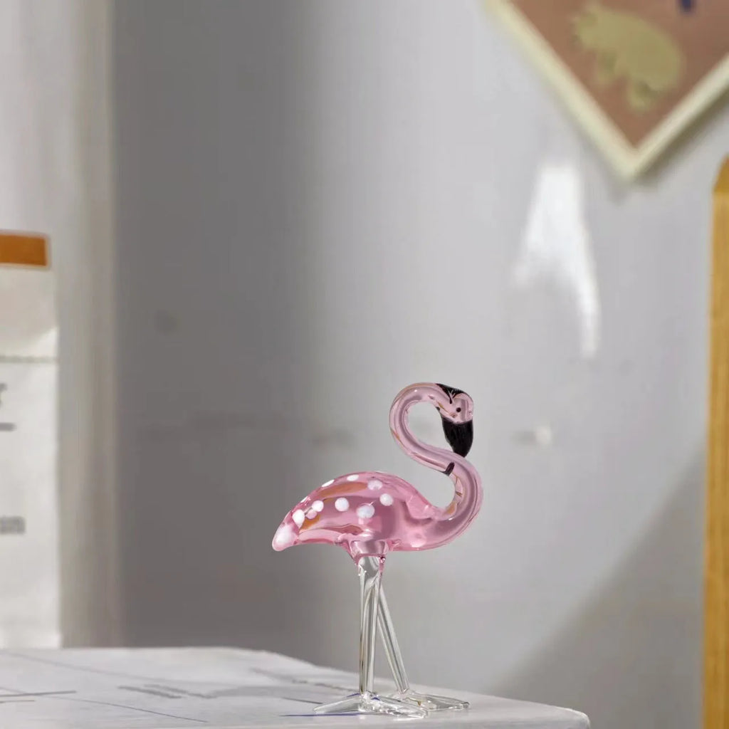Pink crystal flamingo decorative figurine on table with modern simple style