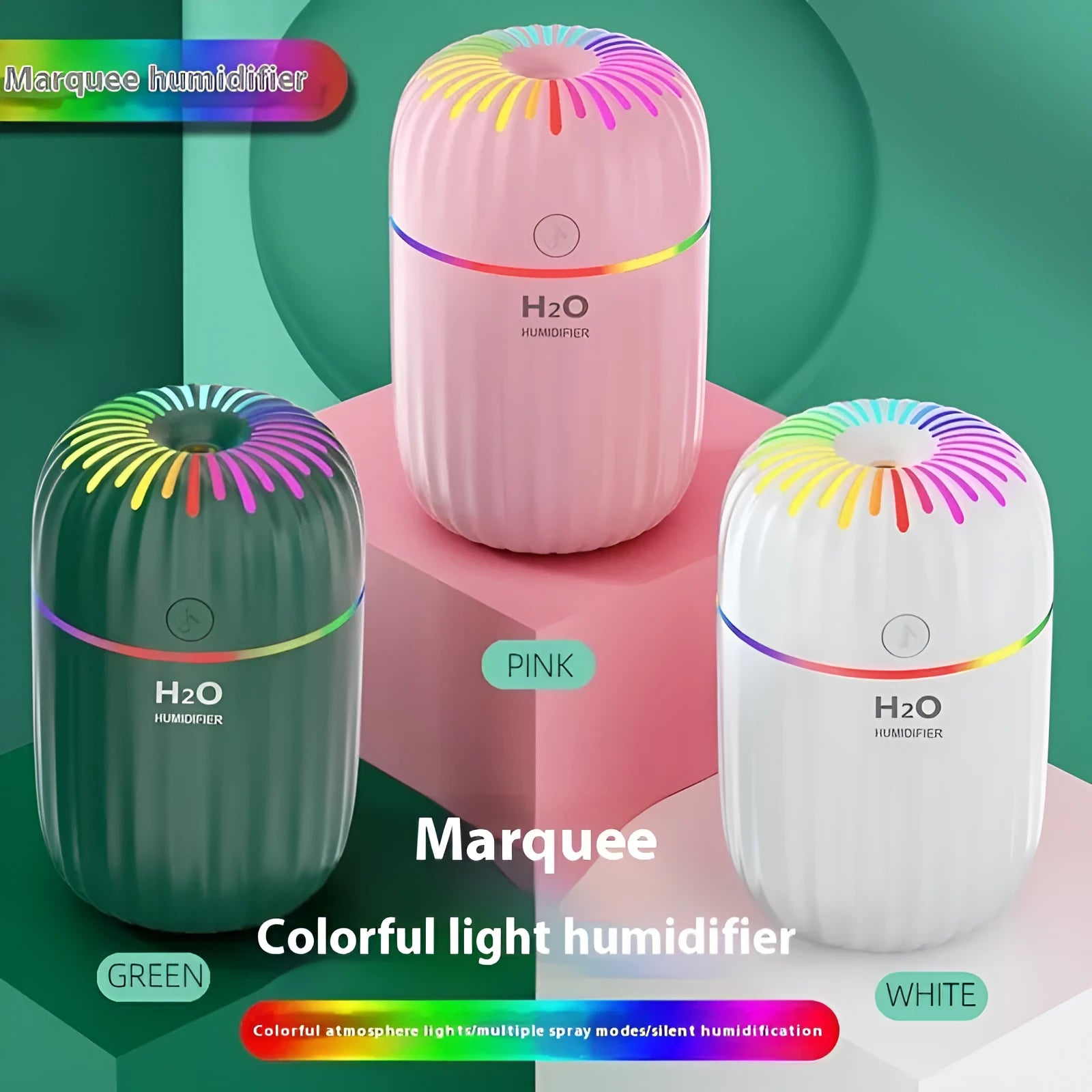 Mini animal-shaped USB aromatherapy humidifier in green, pink, or white colour on a desk.