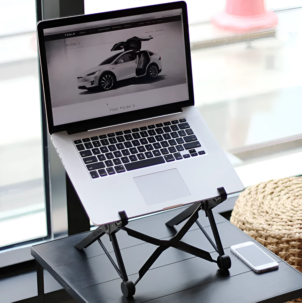 Black folding portable laptop computer stand made from reinforced nylon, shown in both folded and open positions.
