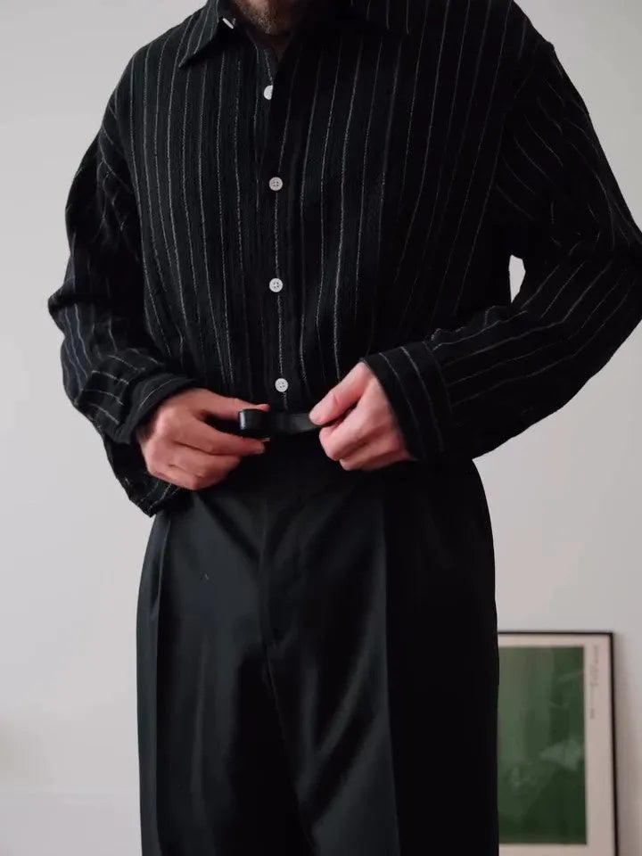 Black pinstriped button-down shirt with regular fit and long sleeves