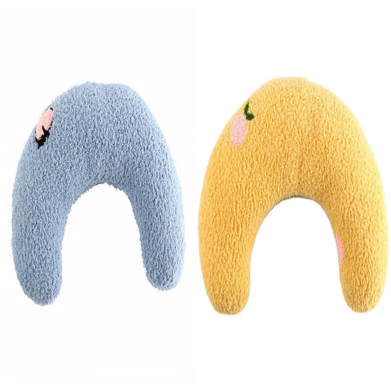 Small half-donut shaped plush pet pillow in blue, showing U-shaped design for cat or small dog neck support.