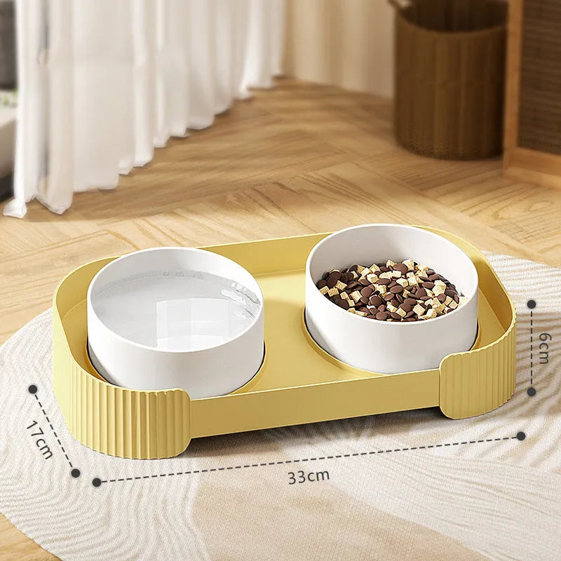Green ceramic raised cat bowl set with two bowls on a tilted stand