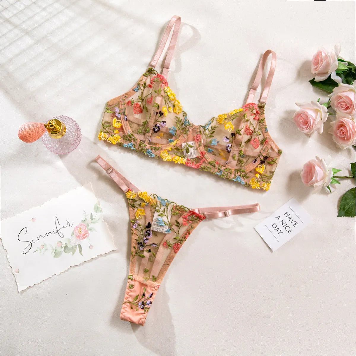 Floral mesh bra and T-back underwear set with steel ring detailing in skin colour option