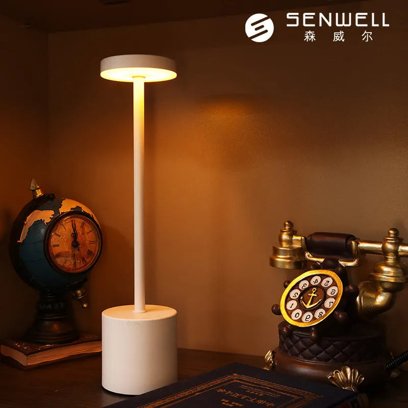 Modern minimalist iron LED table lamp with warm diffused glow, silver finish, I-shaped design