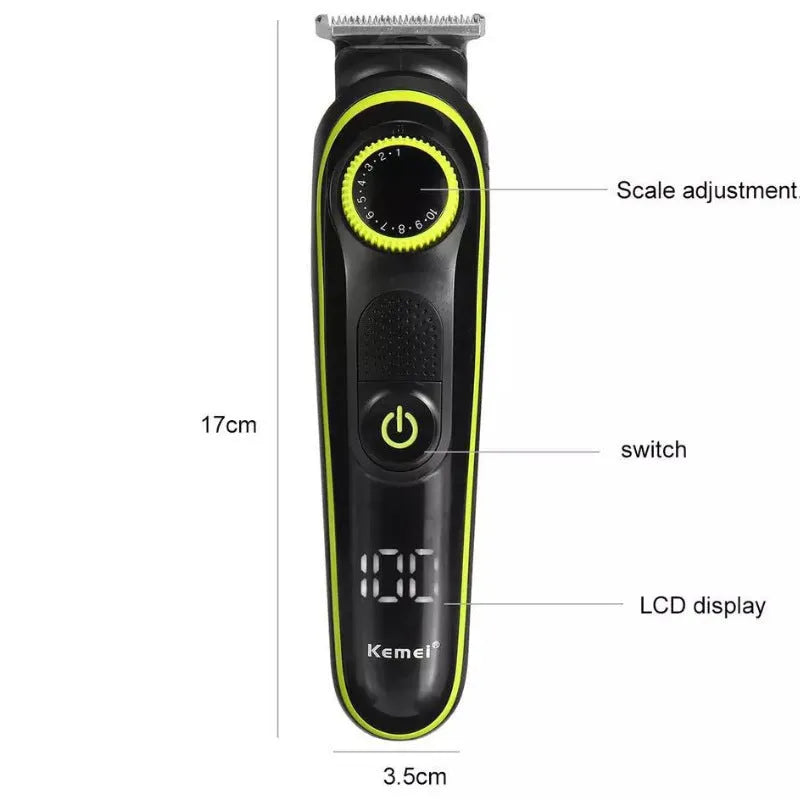Black household electric hair clipper with USB charging cable and cleaning brush on a white background.