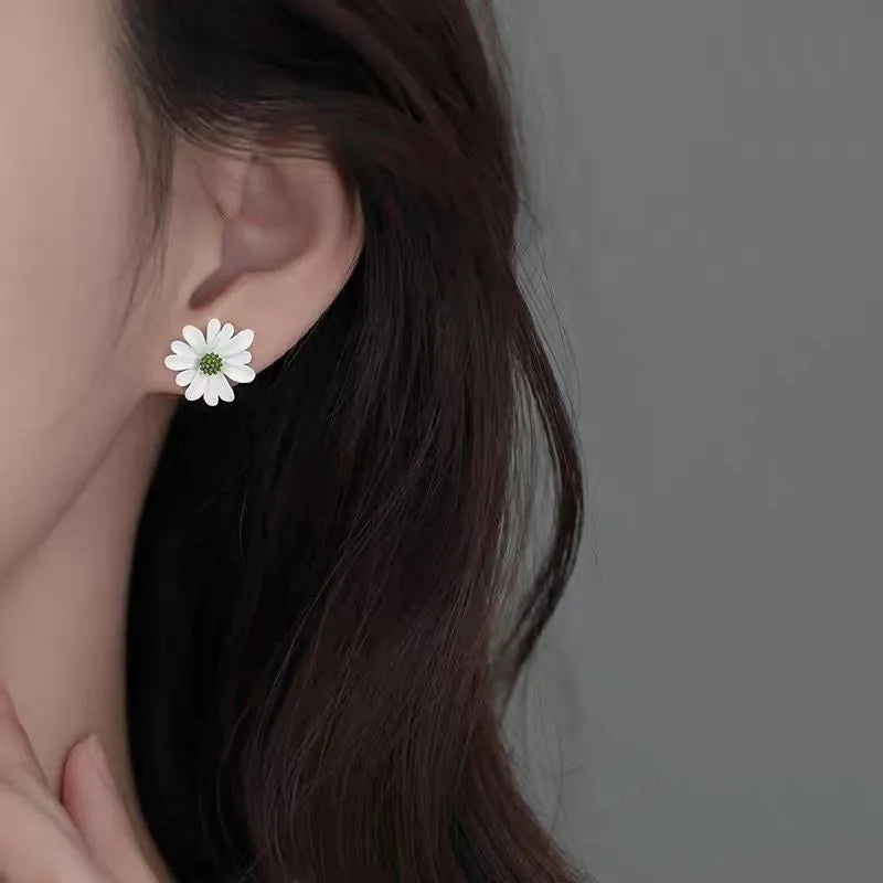 Alloy flower stud earrings in blue and orange, yellow and white, or white and green colour options