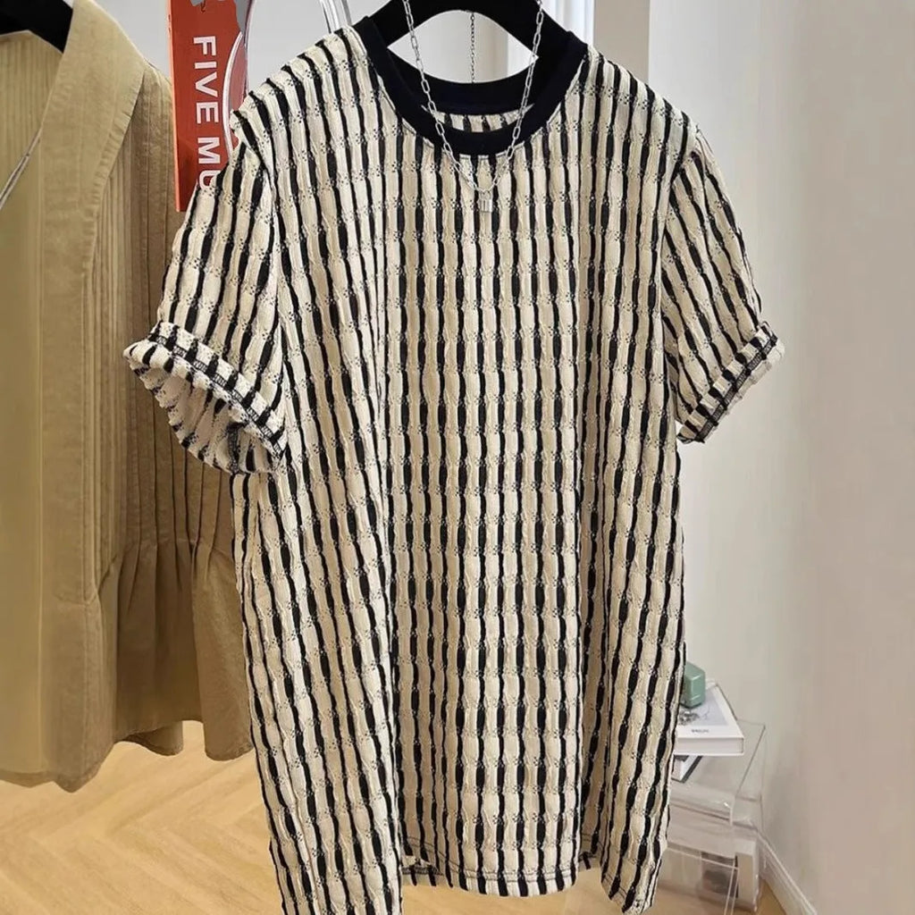Black striped men's pullover shirt with loose fit and short sleeves made from linen silk blend fabric