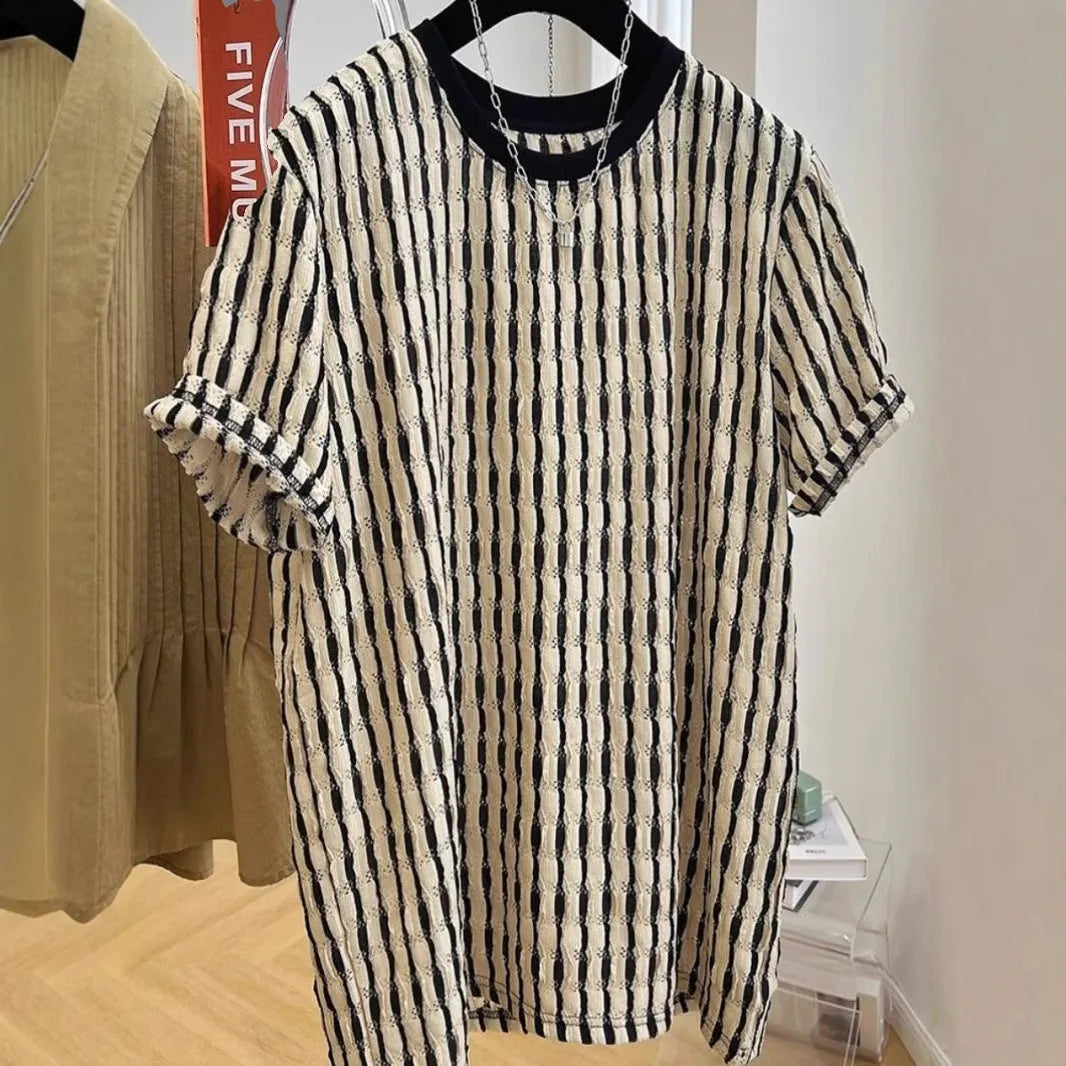 Black striped men's pullover shirt with loose fit and short sleeves made from linen silk blend fabric