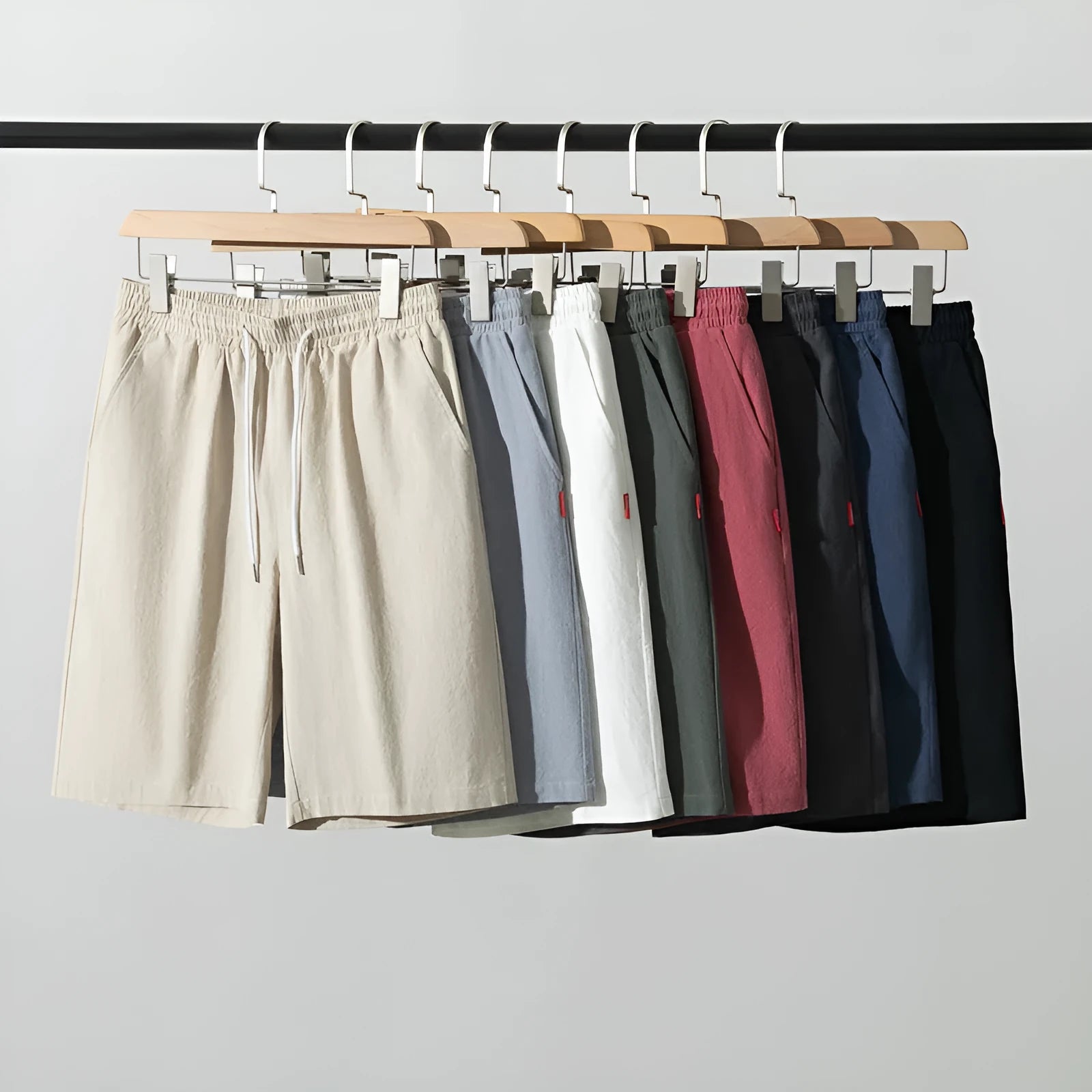 Chinese style solid colour cropped pants in cotton linen fabric on a neutral background.