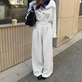 White striped wide-leg commuting pants with loose casual fit and zipper closure
