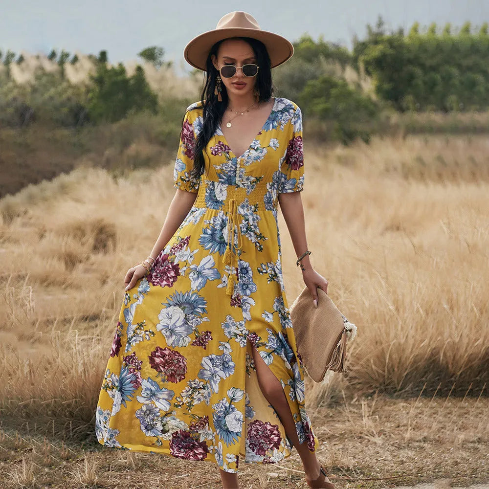 Women's floral summer beach dress with V neck and elastic waist in mid-length cut