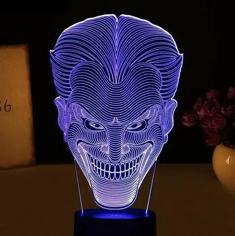 USB-powered 3D acrylic LED table lamp showing multiple colour options and remote control.