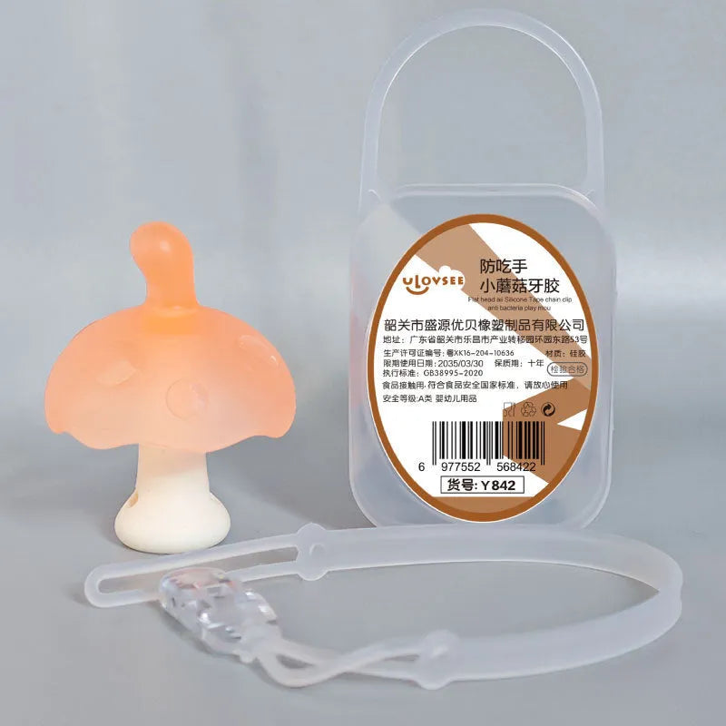 Small latex mushroom gum silicone toy in a transparent box with a chain.
