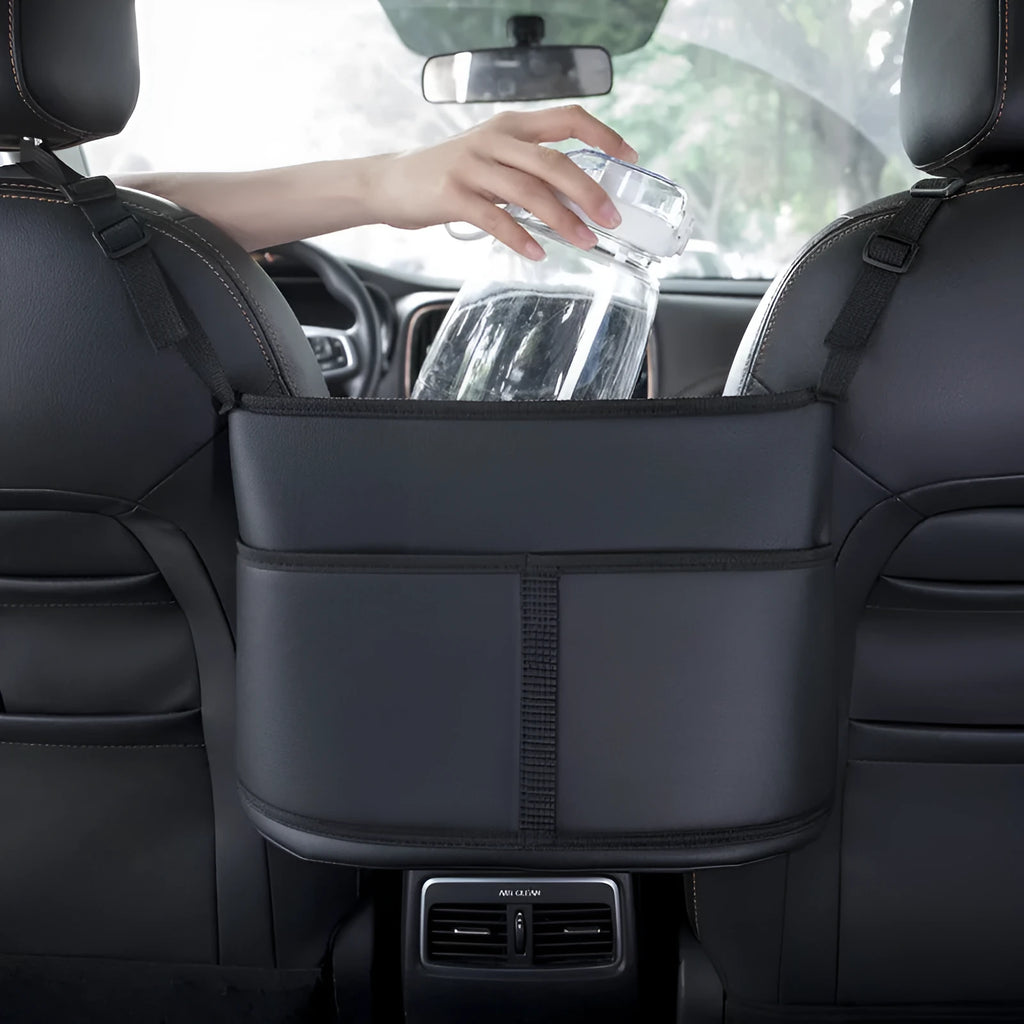Leather car seat storage bag with carbon fibre pattern black finish showing 38x24x15cm dimensions