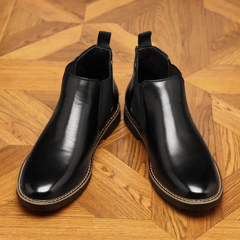 Men's black formal leather pointed-toe boots with square heel on neutral background