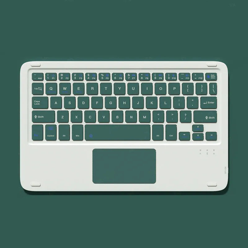Pink Bluetooth touch keyboard and rechargeable wireless mouse on a desk next to a tablet.