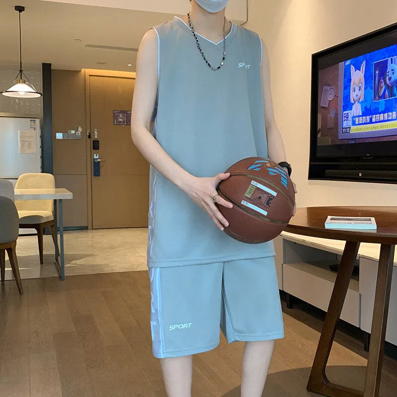 Men's basketball sleeveless vest and shorts set in polyester, available in five colours, front view