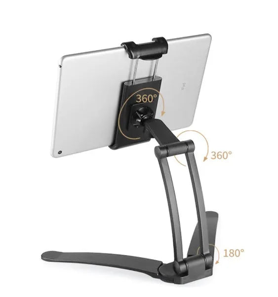 Silver aluminium desktop tablet stand with adjustable angle and folding clamp holding a tablet.