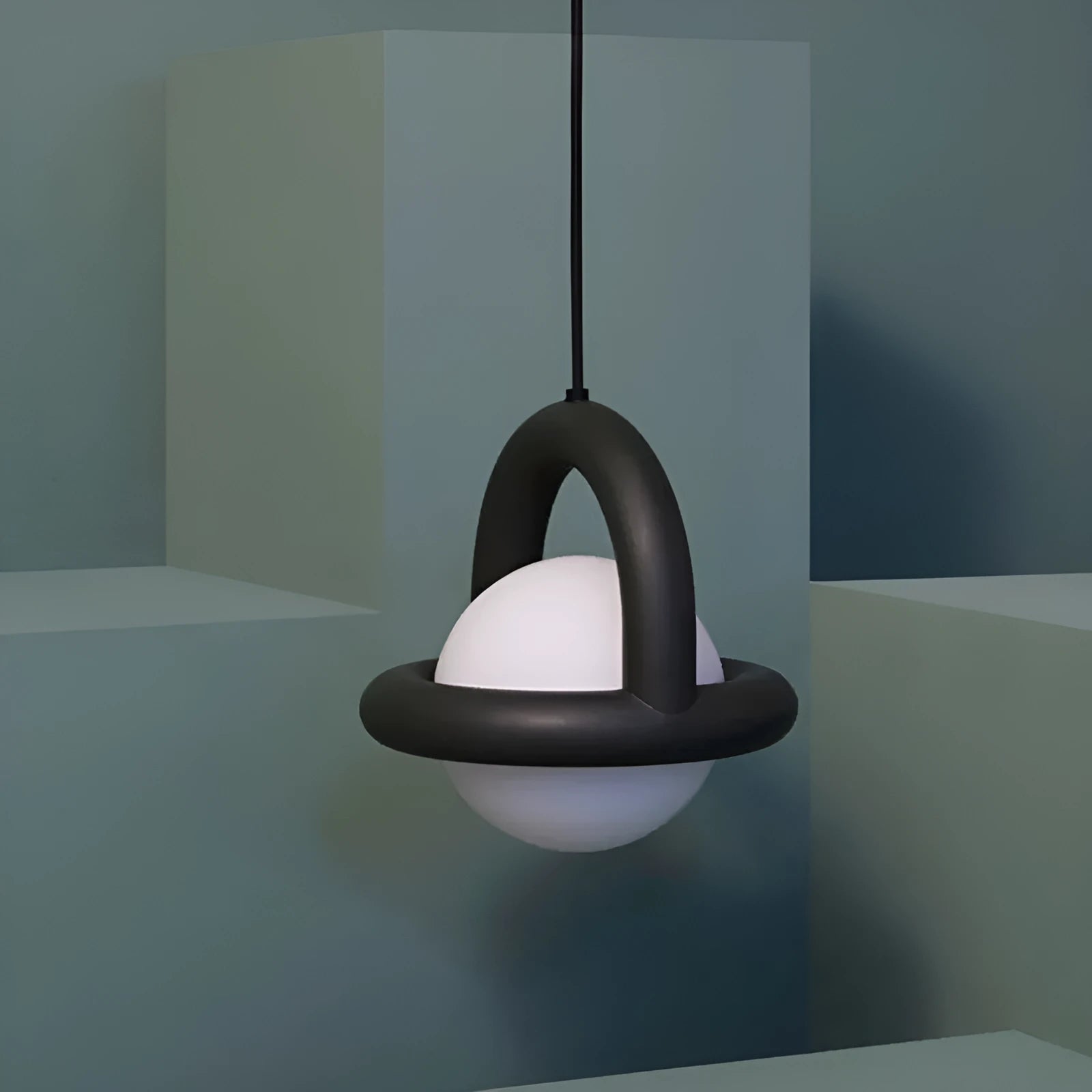 Modern Nordic-style pendant hanging lamp in a matte black finish with warm light.