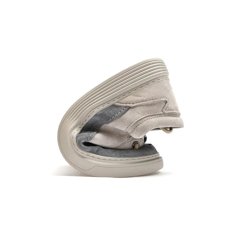 Men's grey pigskin leather casual skate shoes with flat rubber sole and lace-up front.