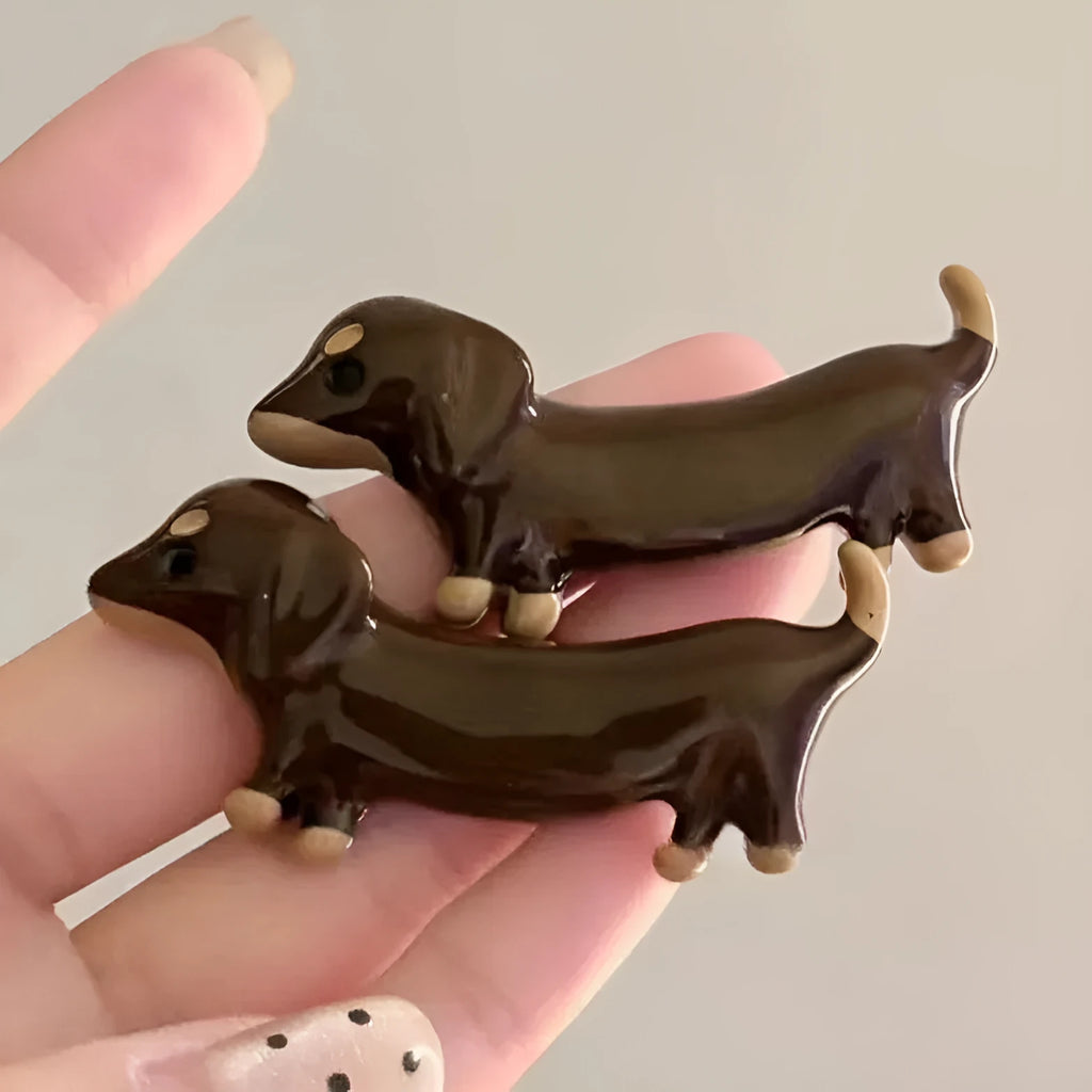 Dachshund dog design hair barrettes with electroplated mixed material construction