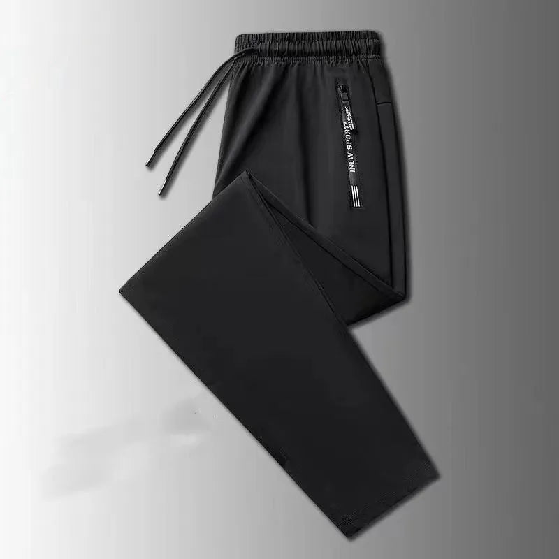 Men's loose fit thin ice silk polyester trousers in black leg style for autumn casual wear