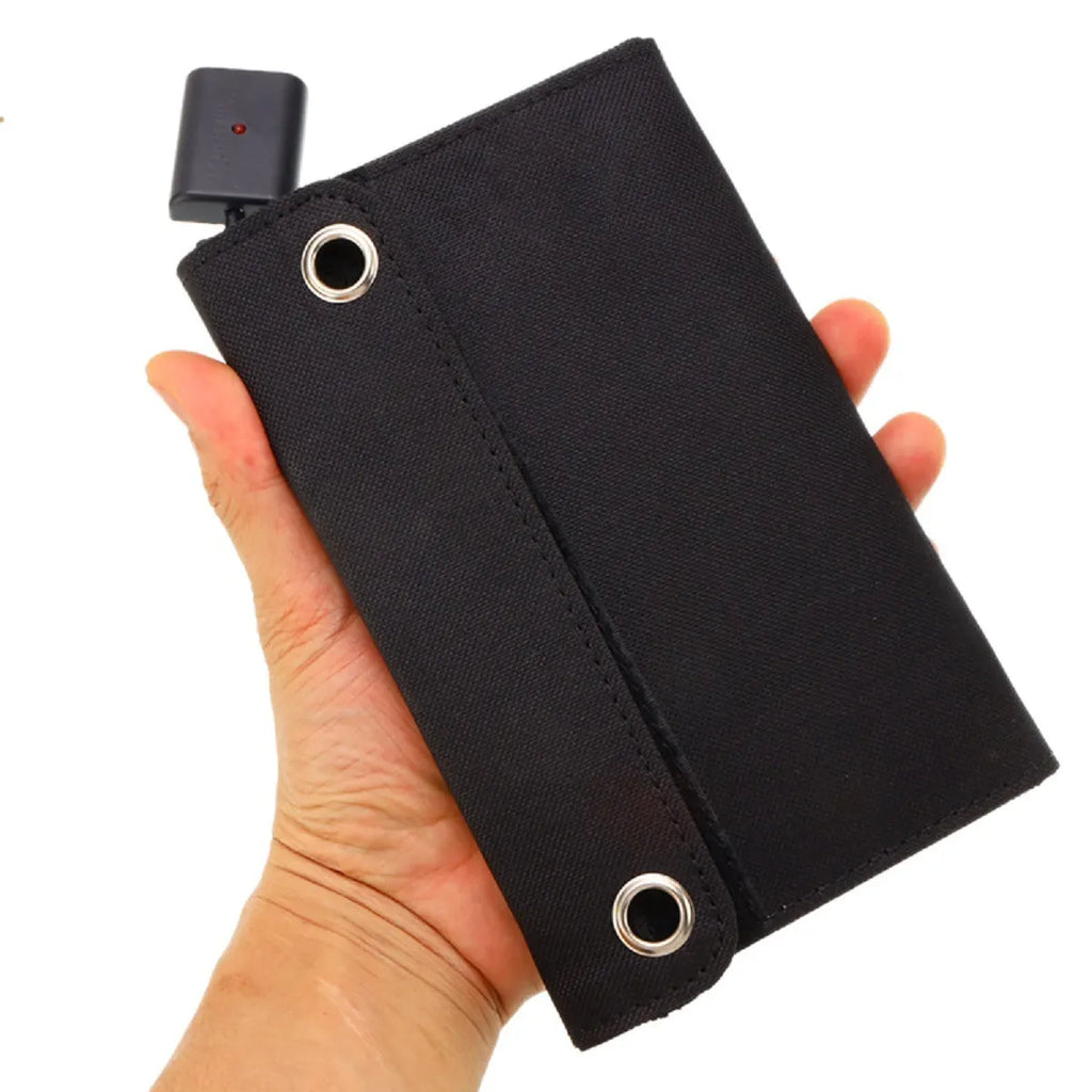Folding solar panel charger in compact bag form with USB output port for outdoor camping use