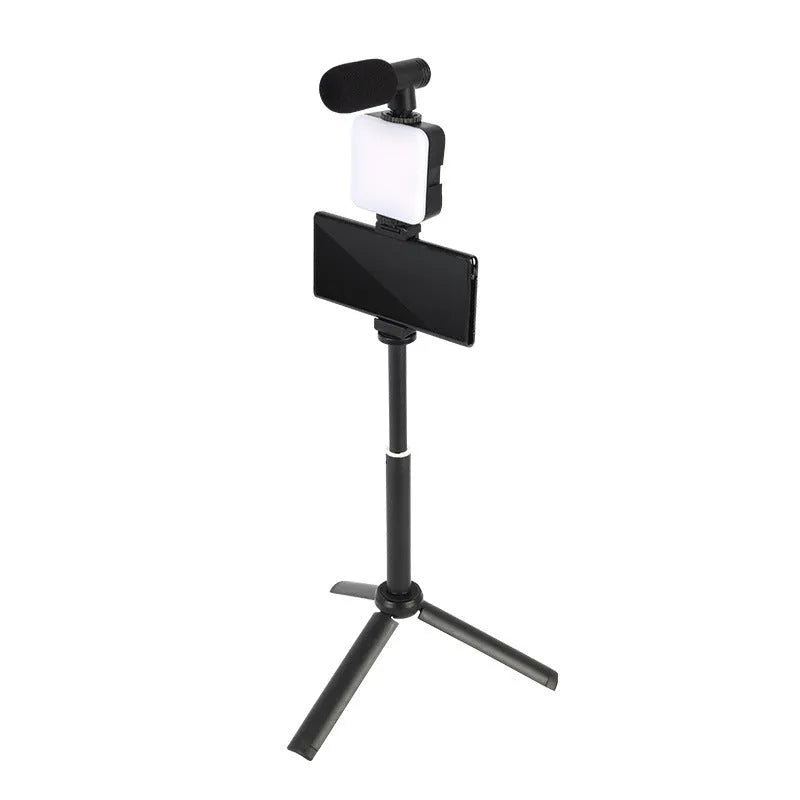Universal LED mini square camera flash with rotatable head on a tripod stand.