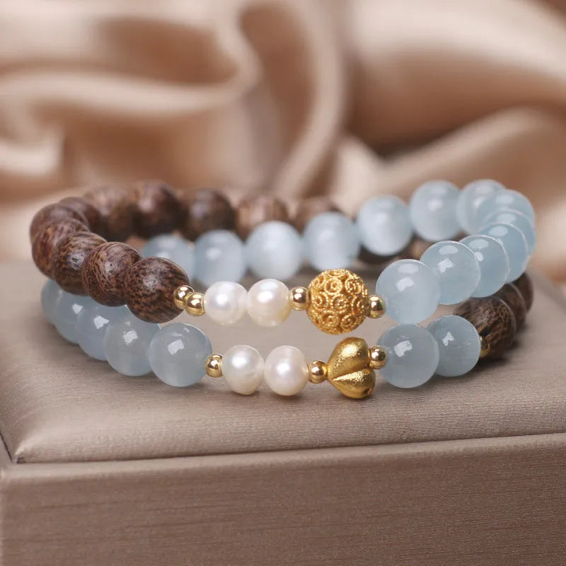 Natural agarwood opal double ring bracelet with light blue crystal lotus seedpod centrepiece, women's ethnic style