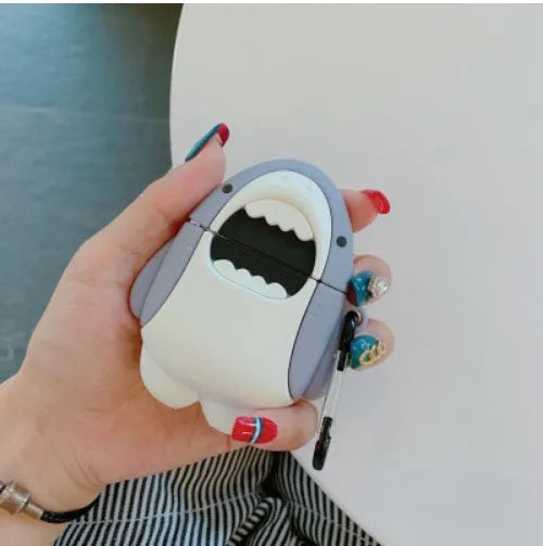 Silicone protective case cover for Apple Airpods 1 and 2 with shark fin accessory attached.