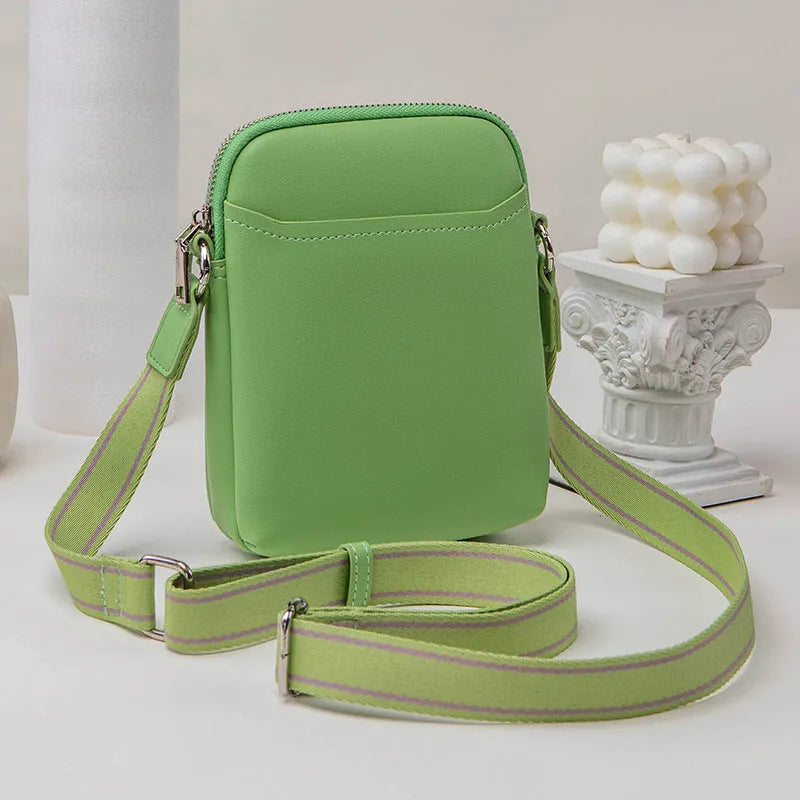 Solid colour PU leather mobile phone crossbody shoulder bag shown in beige.