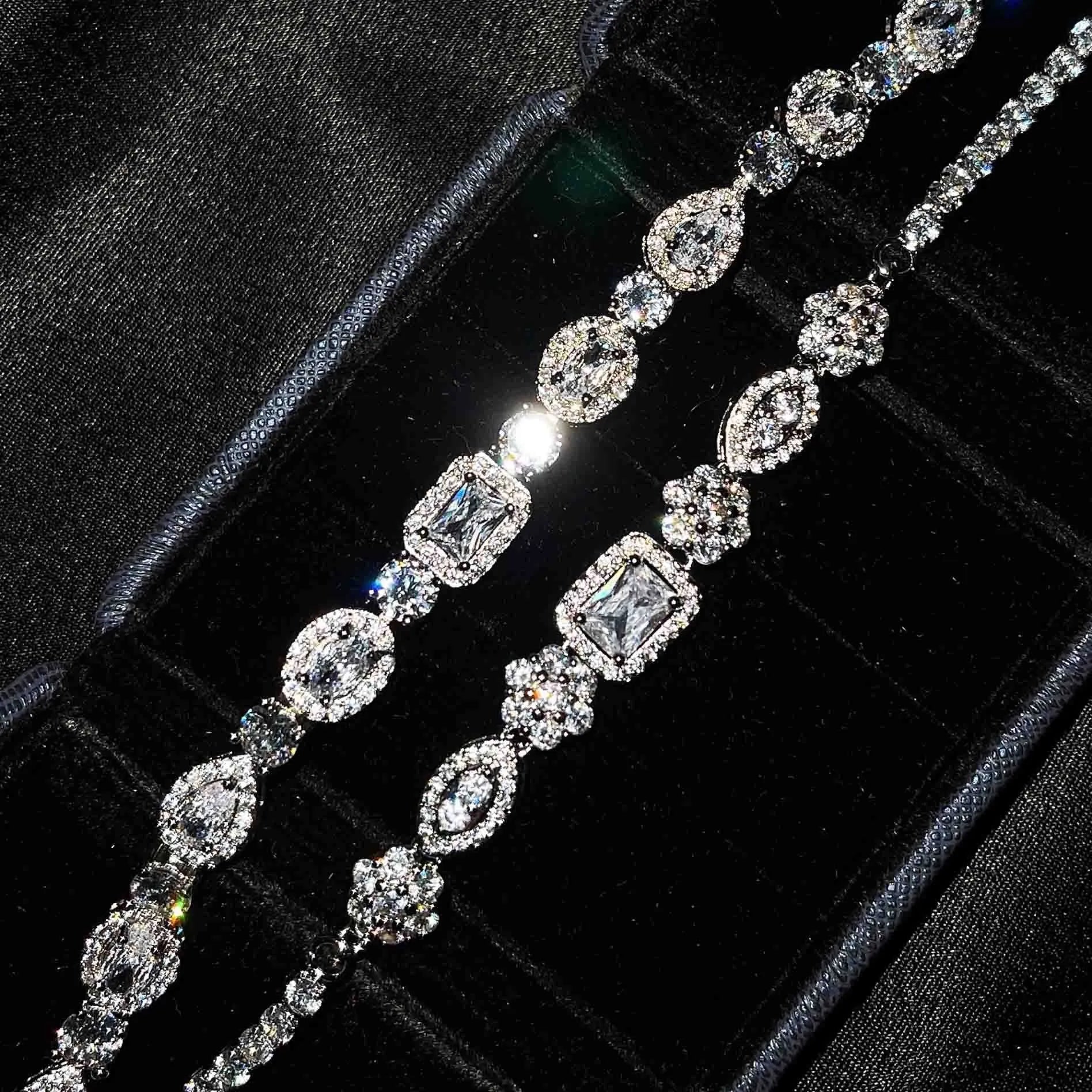 Women's sterling silver-plated bracelet with white gold finish and inlaid zircon stones.