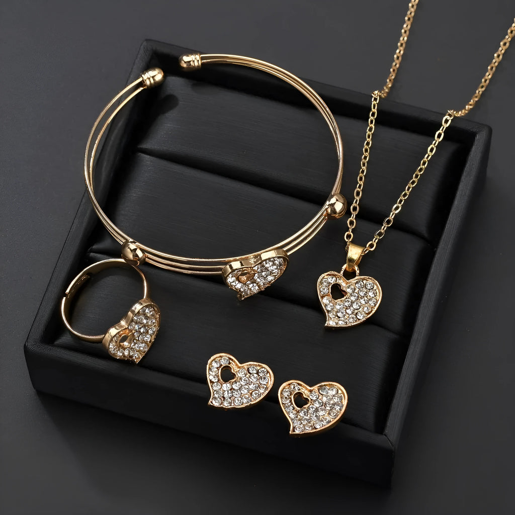 Gold electroplated women's jewellery set with love pendant necklace, earrings, and bracelet on a white background.