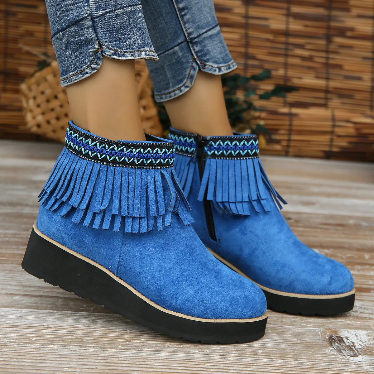 Women's black suede wedge boots with a side zipper and thick platform sole