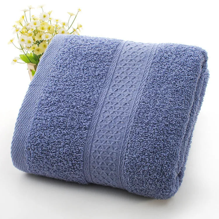 Thickened 800 gsm cotton bath and beach towel shown in apple green colour