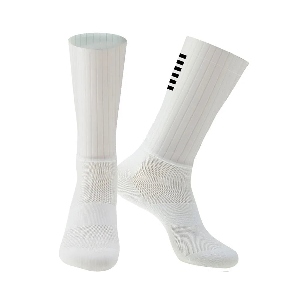 Cycling socks in chemical fibre blend fabric shown in orange, black, purple, white, grey and dark blue colour options