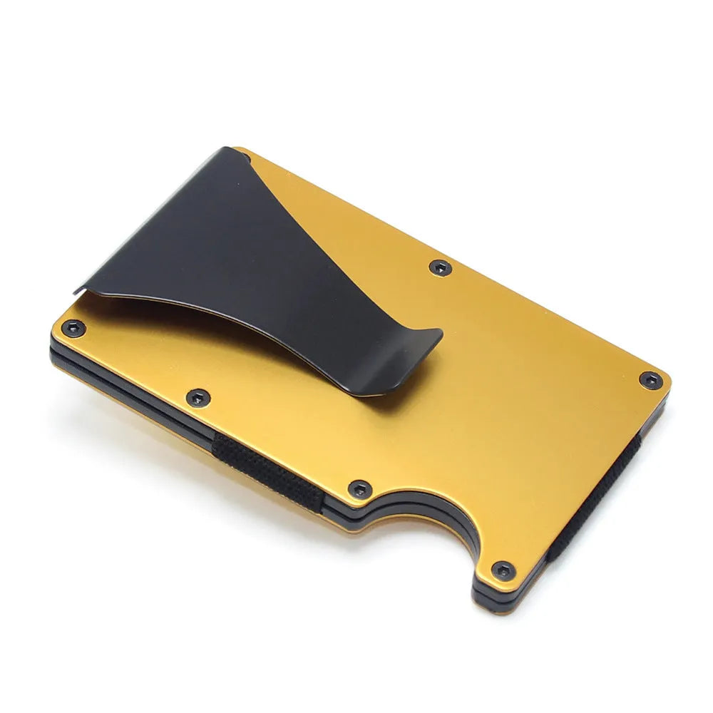 Geometric carbon fibre and aluminium slim card holder wallet in multiple colour options on a table.
