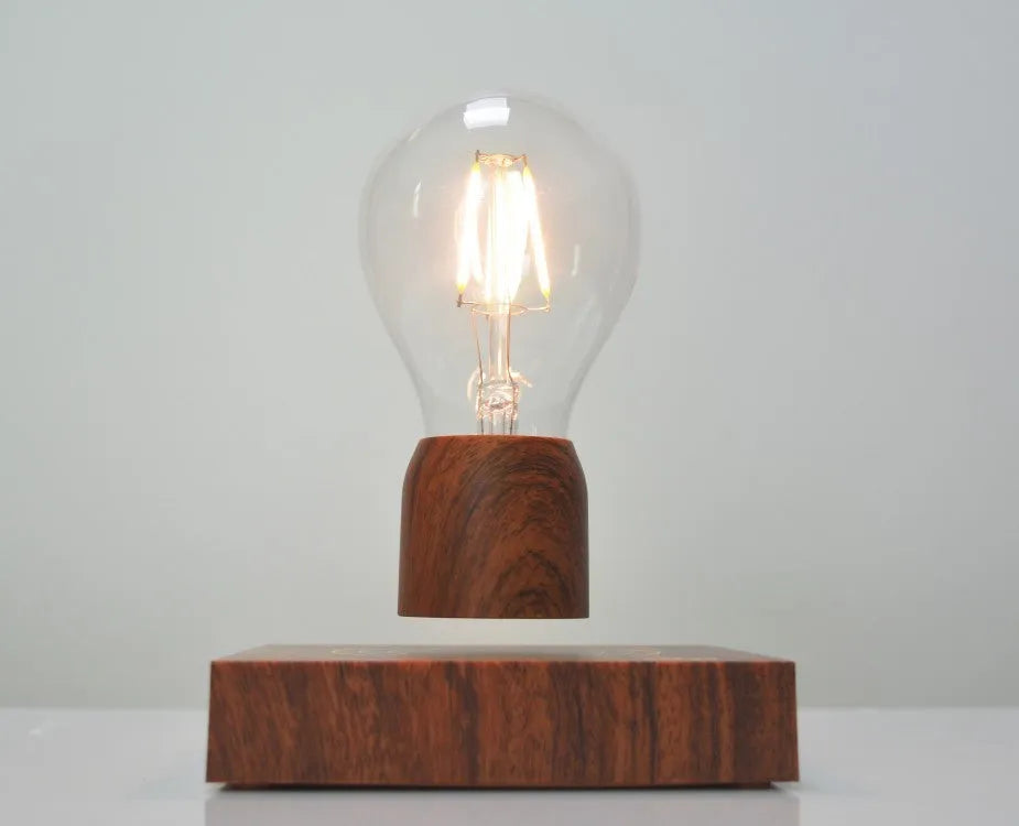 Magnetic levitation floating light bulb on imitation wood base