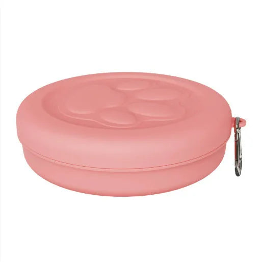 Portable plastic dog bowl with snack compartment and metal carrying clip in light green colour.
