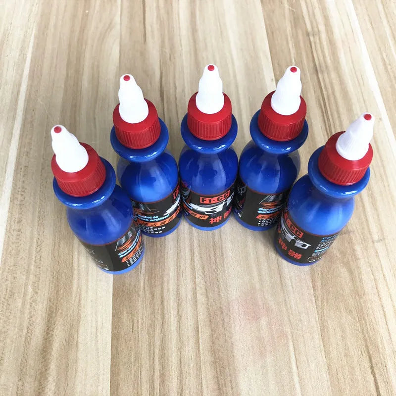 50ml blue automotive scratch repair bottle with integrated wiping tool for vehicle paint touch-up