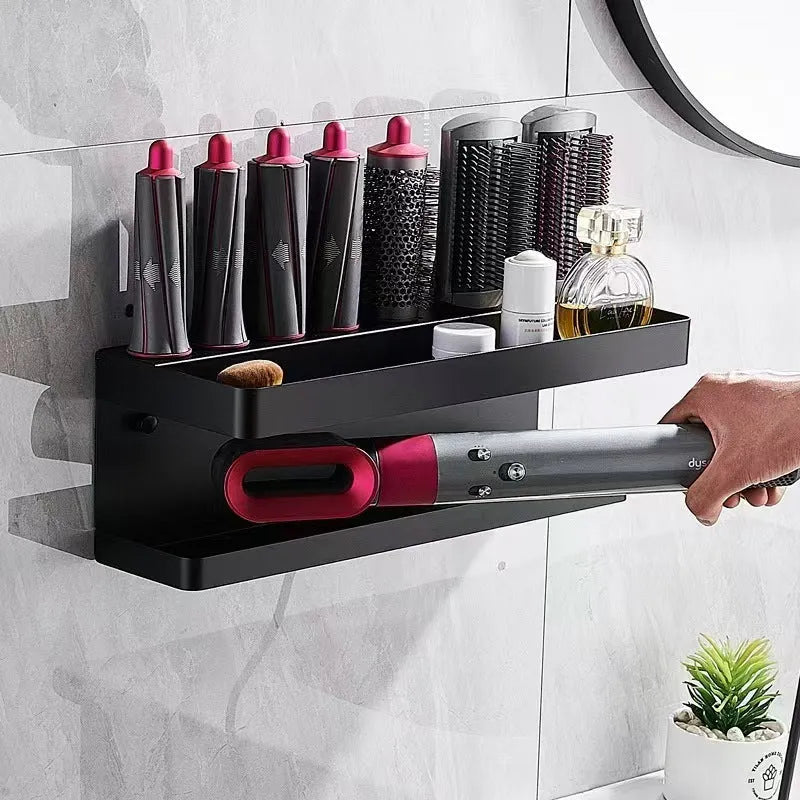 Aluminium punch-free bathroom storage rack holding 7 hair curlers in Marcel waver shape