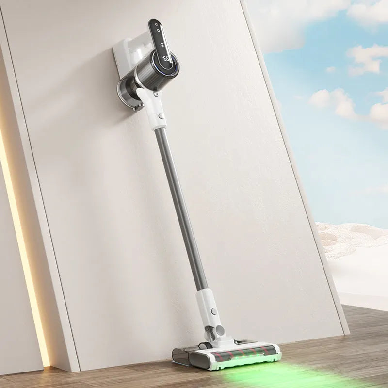 Light gray wireless handheld folding tube vacuum cleaner with LED light on a hard floor