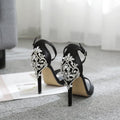 Black suede women's high heel shoes with rhinestone accents and fishmouth toe
