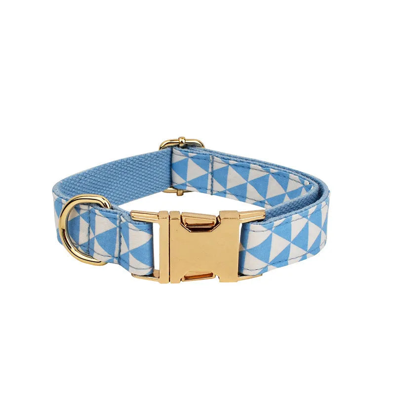 Blue triangular ring rope dog harness set with collar, lead, decorative bow and vest on cloth material
